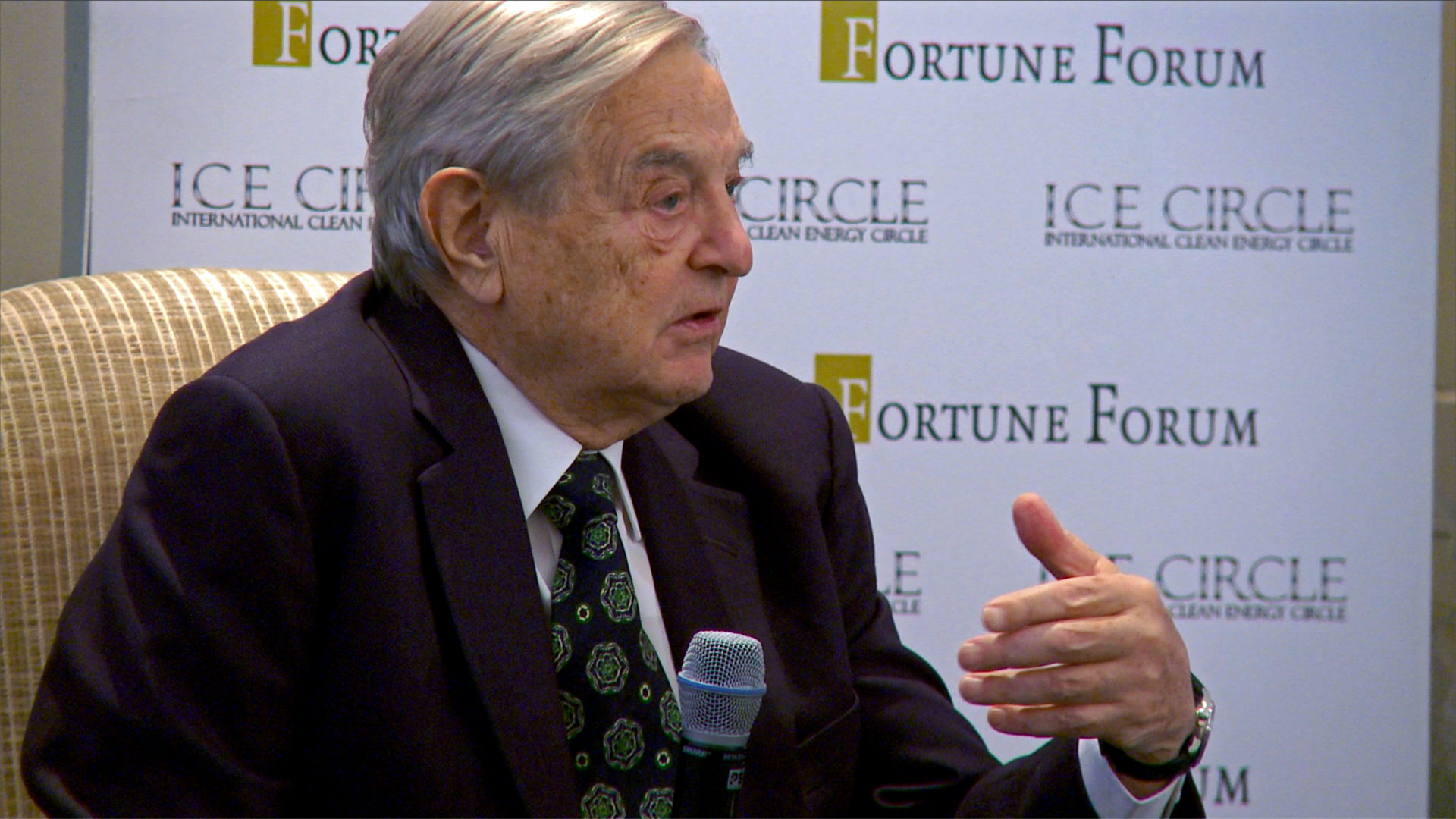 Disparity film still, George Soros at Fortune forum event