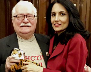 Renu Mehta with Lech Walesa, Solidarity, and tiger Tim toy